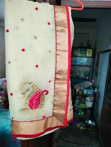 Cream Red Colour Saree With Blouse.