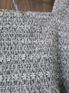 Embroidered Peplum Top