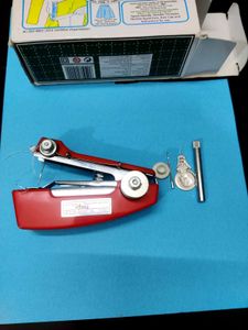 Vintage Ami Handheld Sewing Machine