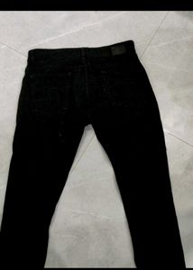 A Black Spykar Denim Jeans