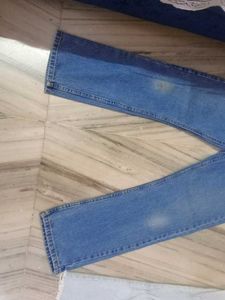 Two Blue Denim Jeans