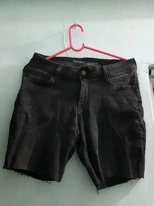 Black denim shorts