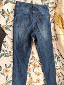 Ripped Knee Denim Jeans