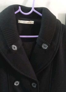 Women woollen long coat . [UNUSED]