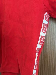 Red Top With Levis Strip At The Sides Turtle Neck