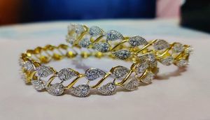 Gold-Tone Designer Bangles with Diamond-Cut Leaf