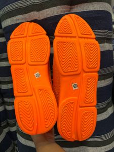 Orange sports shoes for mens