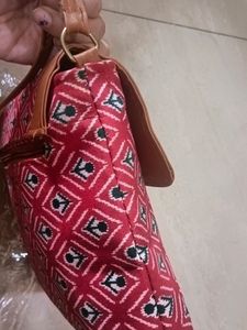 A Cloth Fabric Sling Bag
