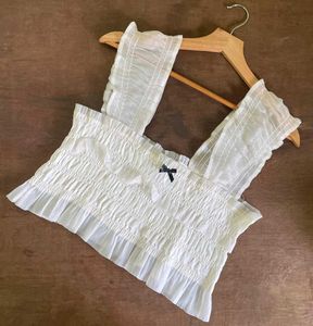 Ivory Ruffle Trim Top