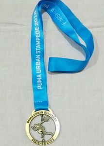 Collectible PUMA Urban Stampede Finisher Medal.