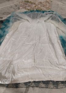 Beautiful Off White Gown With Two Tone Net Fabric