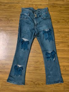 Bow Accent Flare Jeans