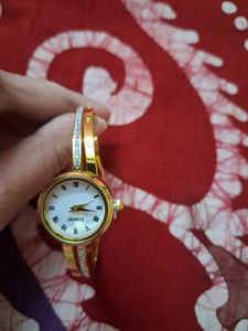 Elegant Gold Bangle Watch