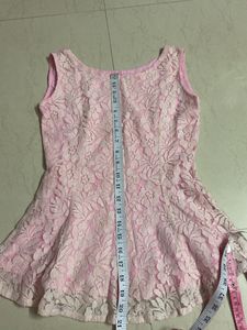 Lace peplum coquette top