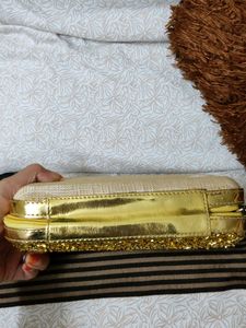 Price Dropped Golden Clutch Without Chain .