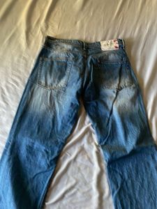 Distressed blue Denim Jeans