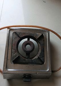 Old Gas Stove With Pipe