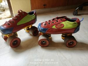 Used 7-9 Years Roller Skates &amp; Safety Kit Includes