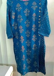 Tail Blue Colour Kurti With Beautiful Golden Pattern