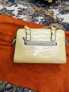 butter yellow handbag