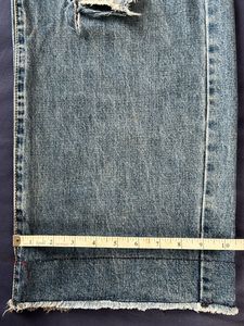 Distressed Wide Leg Denim Jeans