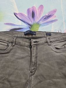 Gray Denim Jeans with Pom-Pom Detail