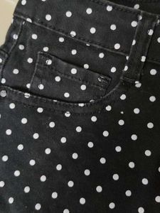 A beautiful black hipster shorts with polka dots.