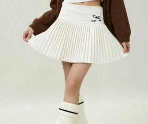 Pleated Mini Skirt with Bow