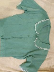 A beautiful sea green coloured crop shirt..