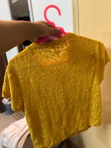 Brown off-shoulder ruffle top