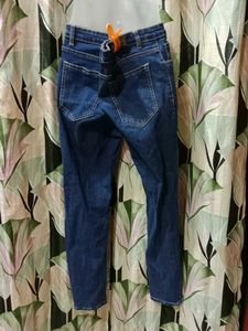 Ripped Dark Blue Jeans