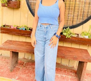 beautiful sky blue top. good condition worn only once. can style with black or blue jeans and with skirts . looks super classy.