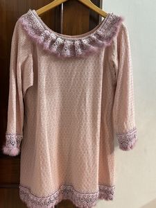 Tunic With Feather Detailing