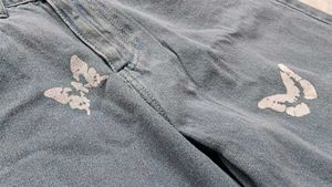 Butterfly Ripped Wide Leg Jeans