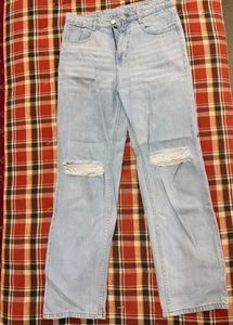 Ripped Light Wash Denim Jeans