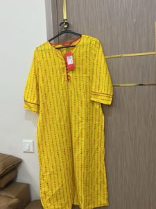 Yellow Printed Kurta And Red Pallazzo