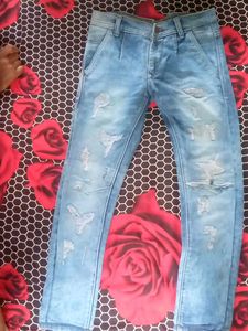Ripped Light Wash Denim Jeans