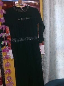 a green color gown having  modern look