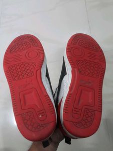 Puma Rebound Joy Sneakers