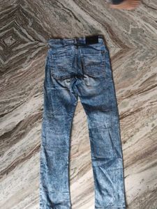Ripped Blue Denim Jeans