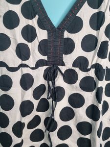 A Black&amp;white Dott Printed Tank Top.
