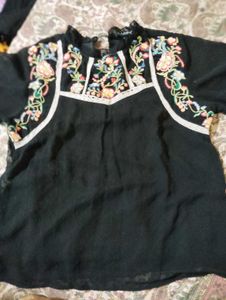 Embroidered Black and peach top