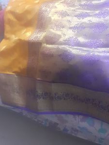 mango colour saree with ready stitched pattern blouse....