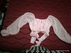 Beautiful pink color top. Small in size.