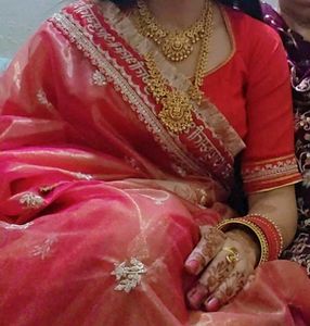 red saree with backless blouse