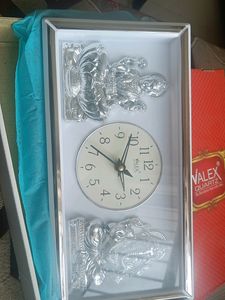 Valex Brand Clock With Idols Of Lord Ganesha And Lakshmi Ji