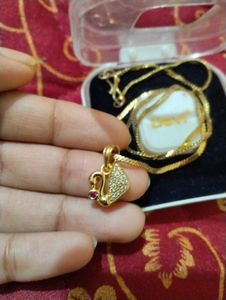 Devi Gold Tone Swan Pendant Necklace
