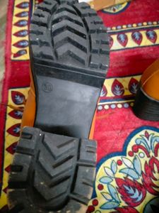 A Pair Of Beautiful Casual Tan Boot For Ladies.