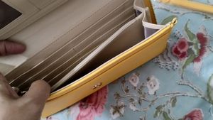 Ladies Clutch In Yellow Colour