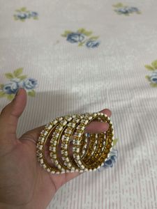 Golden Bangles With White Beads (Set of 4)